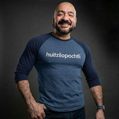 Huitzilopochtli 3/4 baseball tee: blue body, navy blue raglan sleeves, name printed in white across the chest.