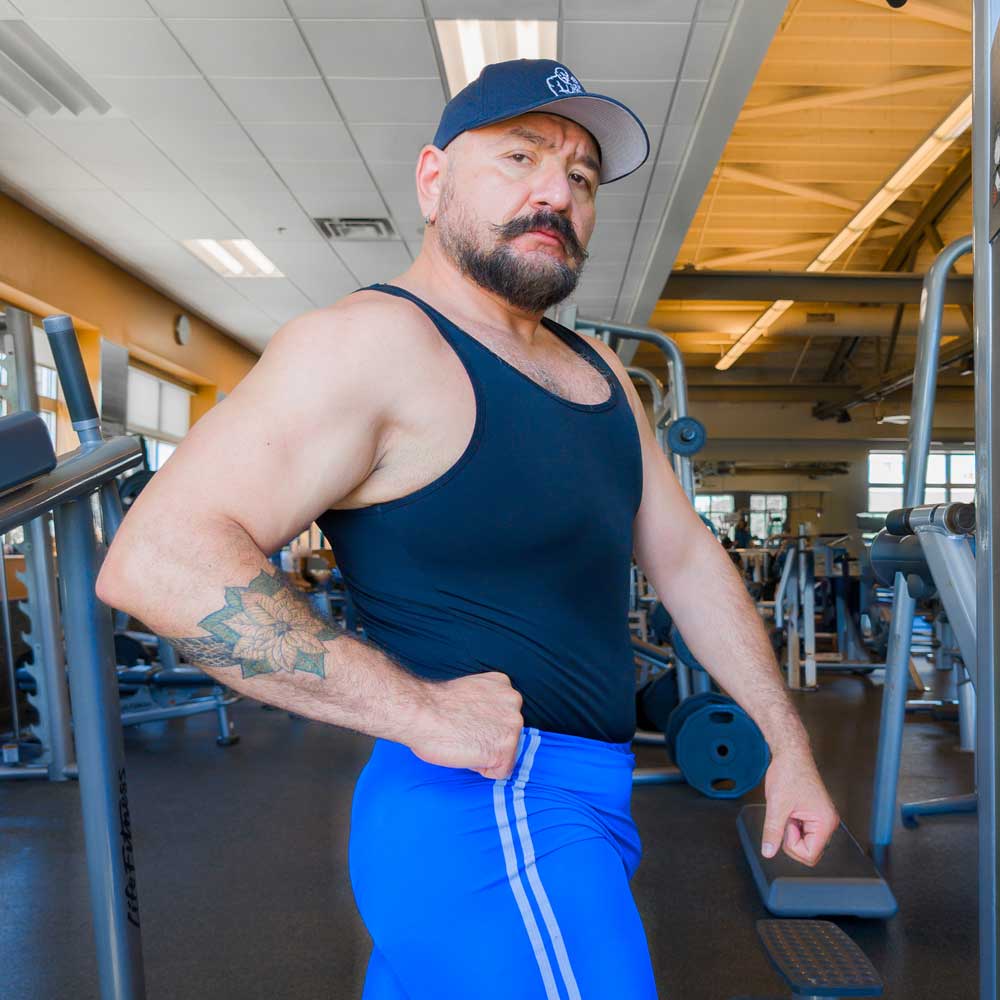 The Snake Hierophant Baseball Hat – Fitted Curved-Brim Cap with Mustached Bodybuilder and Snake Embroidery