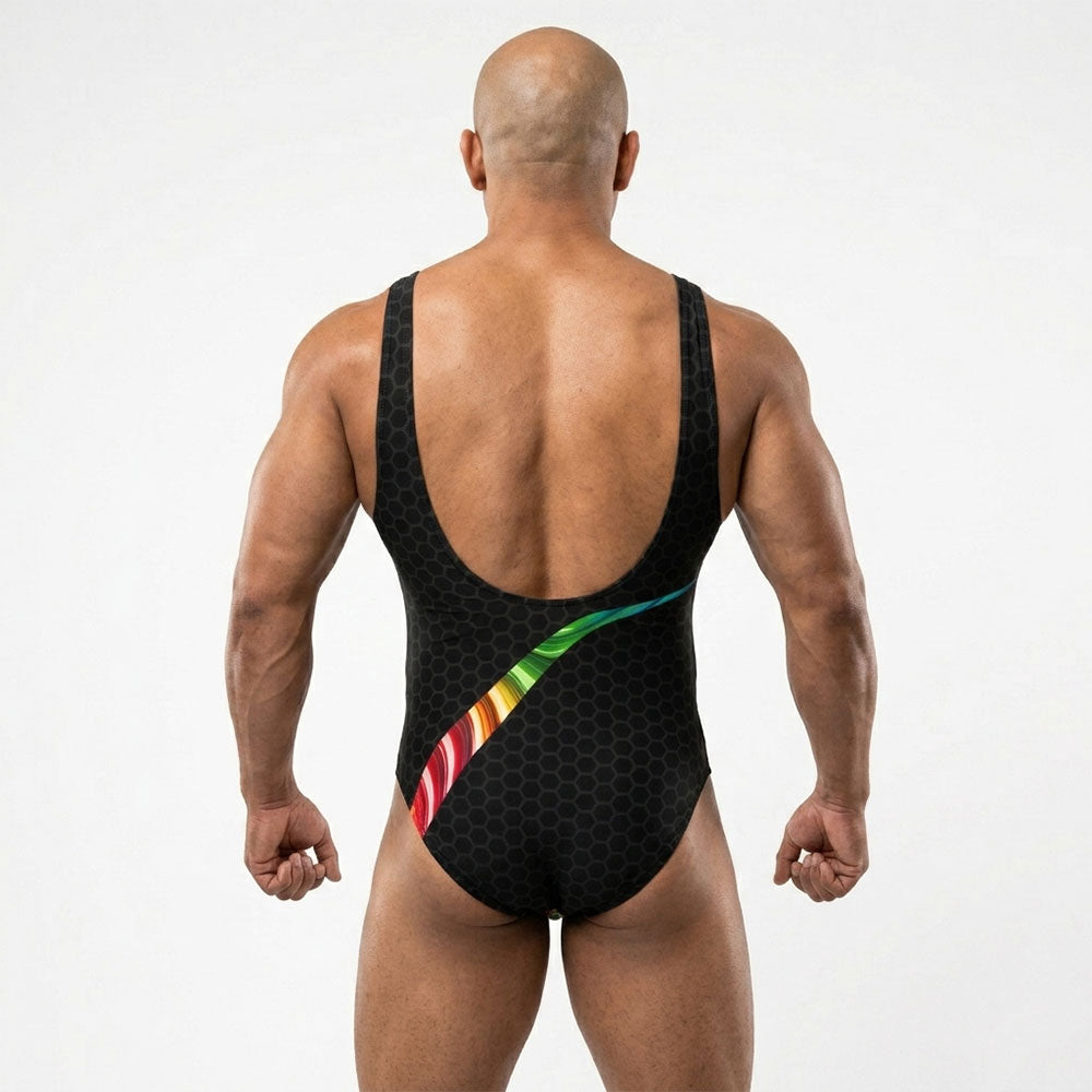 Person wearing a black butcher wrestling singlet with a rainbow stripe on a black background