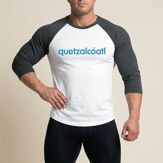 Quetzalcóatl 3/4 baseball tee: white body, charcoal raglan sleeves, name printed in blue across the chest.