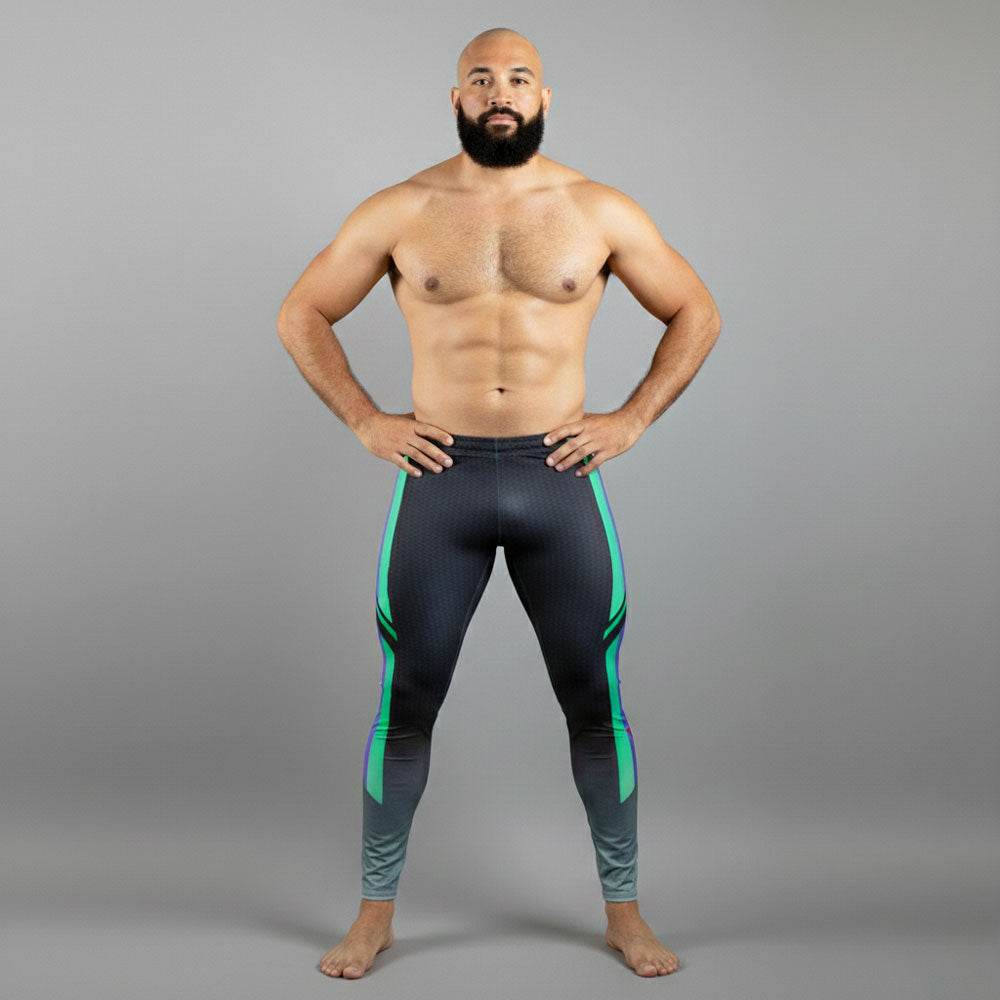 Male bodybuilder in MLM Pride flag colors bodybuilding tights with quetzal emerald green accents.