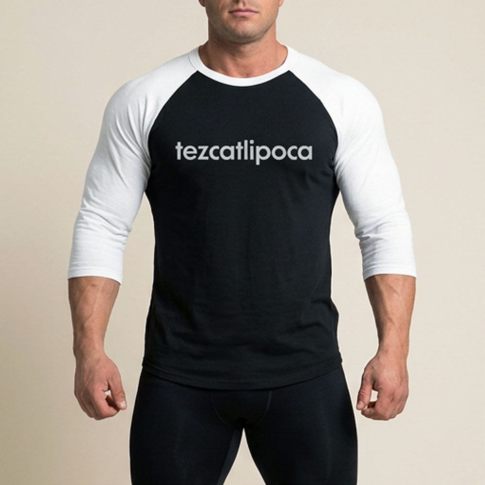 Tezcatlipoca 3/4 baseball tee: black body, white raglan sleeves, name printed in white across the chest.